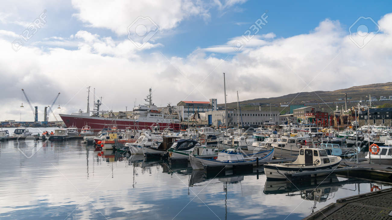 Torshavn, Faroe Islands - August 2019: Fishing boats in Torshavn marina harbour on Faroe islands. - 164356038 Torshavn, Faroe Islands - August 2019: Fishing boats in Torshavn marina harbour on Faroe islands. - 164356038