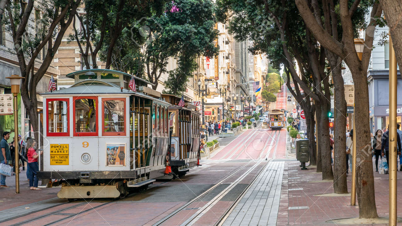 San Francisco, California, USA - August 2019: People riding the cable car in San Francisco. It is the oldest mechanical public transport in California. - 164355970 San Francisco, California, USA - August 2019: People riding the cable car in San Francisco. It is the oldest mechanical public transport in California. - 164355970