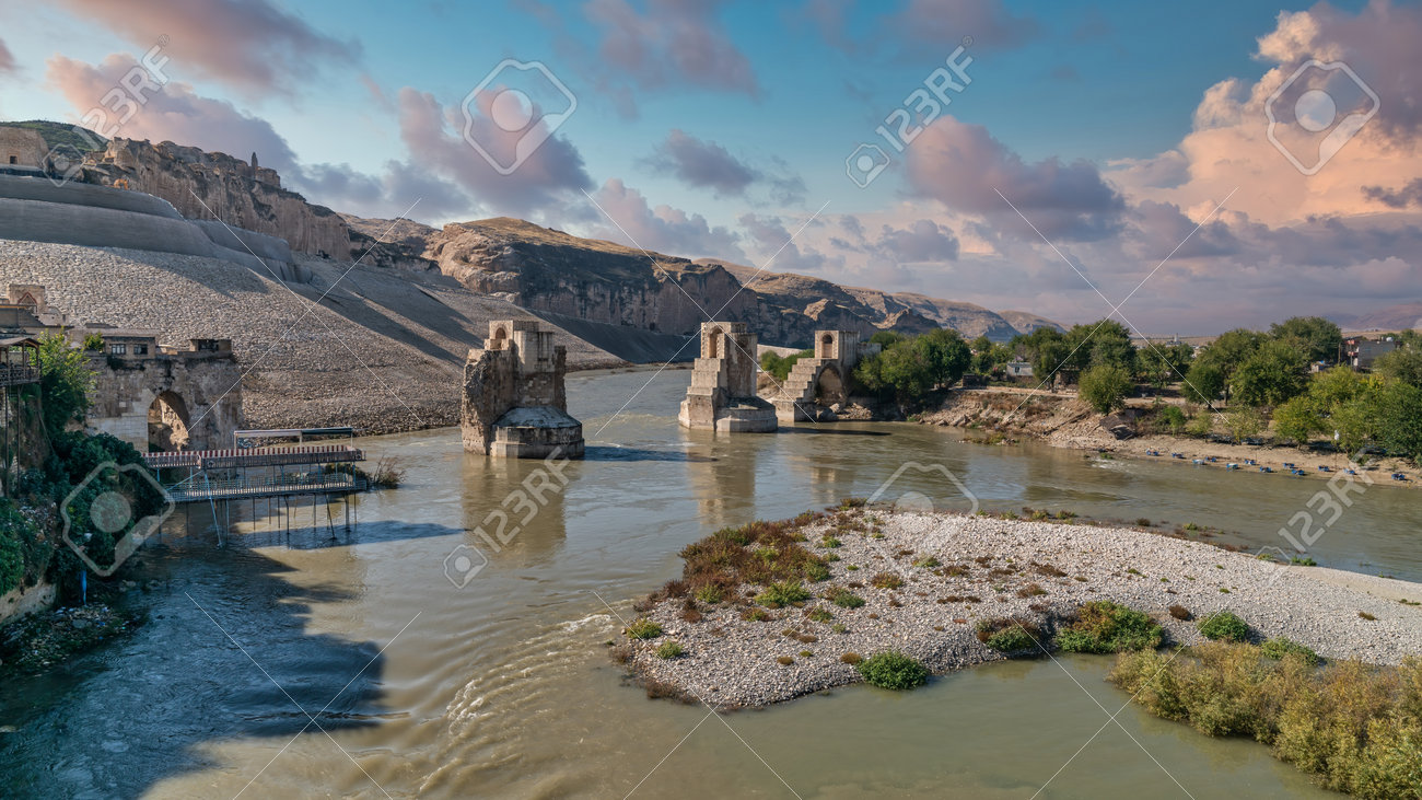 Hasankeyf, Turkey - Remains of the town of Hasankeyf on the River Tigris, famous with stone caves after it is evacuated. The town will be sunk under water of ilisu dam - 170682387 Hasankeyf, Turkey - Remains of the town of Hasankeyf on the River Tigris, famous with stone caves after it is evacuated. The town will be sunk under water of ilisu dam - 170682387
