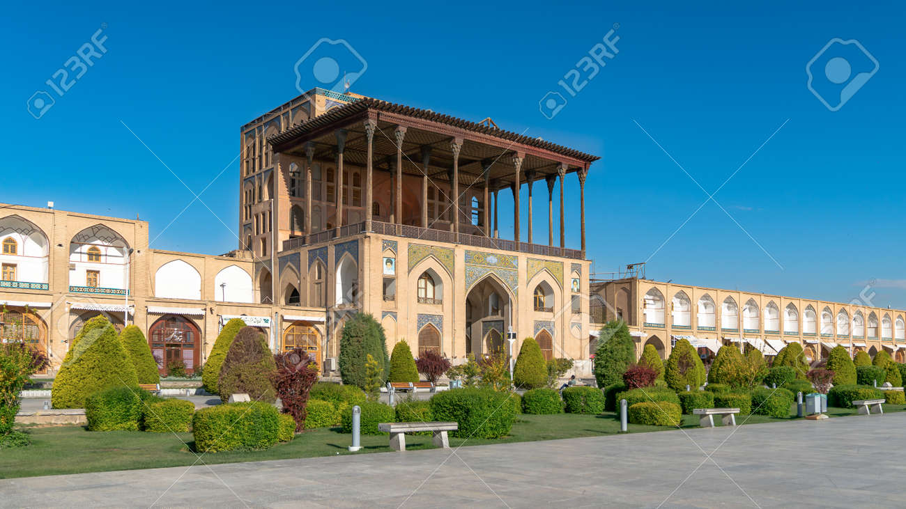 Isfahan, Iran - May 2019: Ali Qapu Palace is a grand palace in Isfahan on Naqsh-e Jahan Square - 169860198 Isfahan, Iran - May 2019: Ali Qapu Palace is a grand palace in Isfahan on Naqsh-e Jahan Square - 169860198