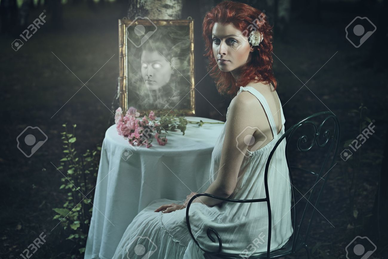Scary Ghost Face In Dark Mirror Fantasy And Halloween Stock - Scary Ghost Face In Dark Mirror Fantasy And Halloween Stock Photo scary ghost face in dark mirror fantasy and halloween stock - scary ghost face in dark mirror fantasy and halloween stock photo