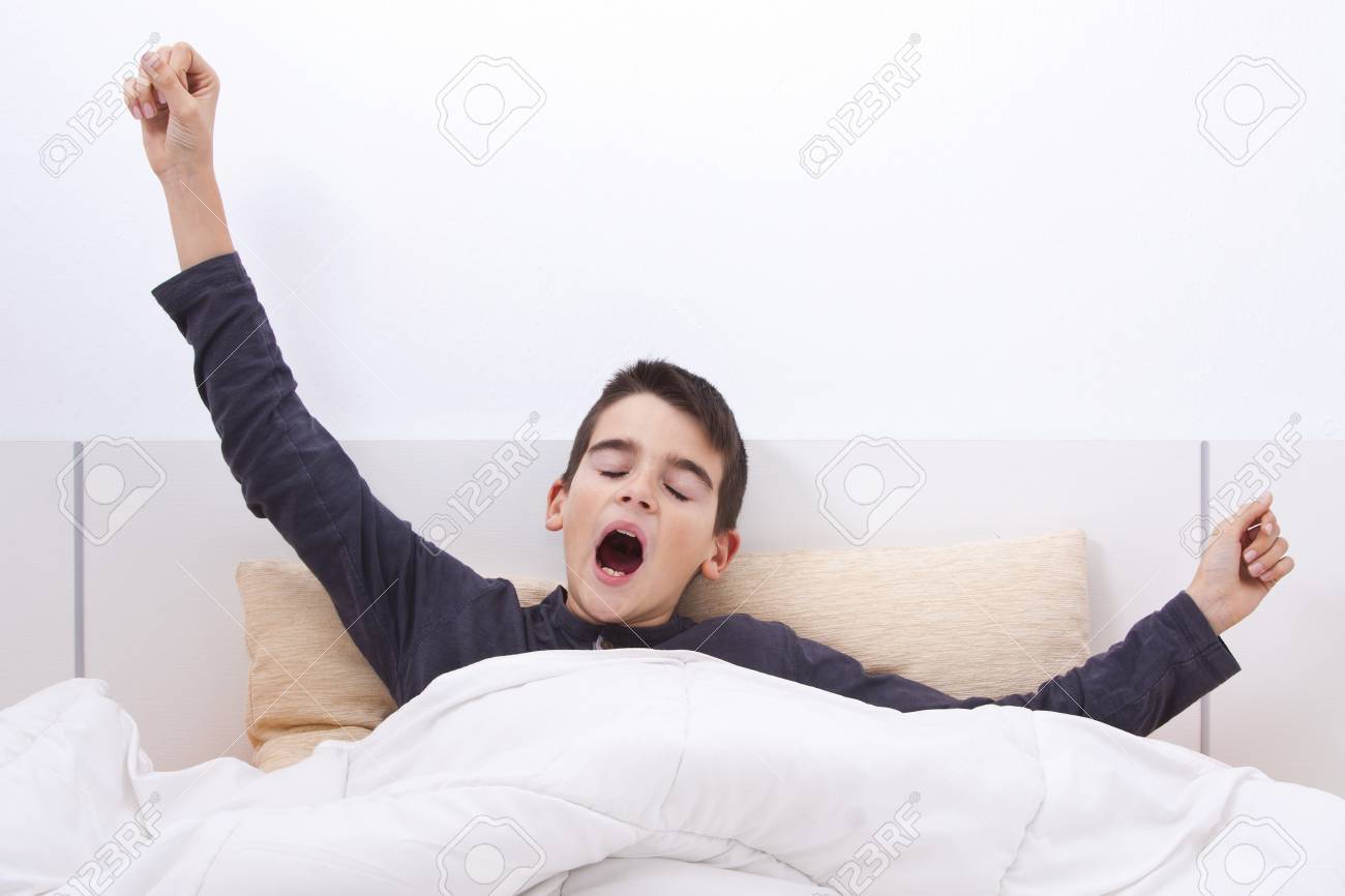 Child Waking Up In Bed In The Morning Stock Photo, Picture and Royalty Free  Image. Image 49571939.