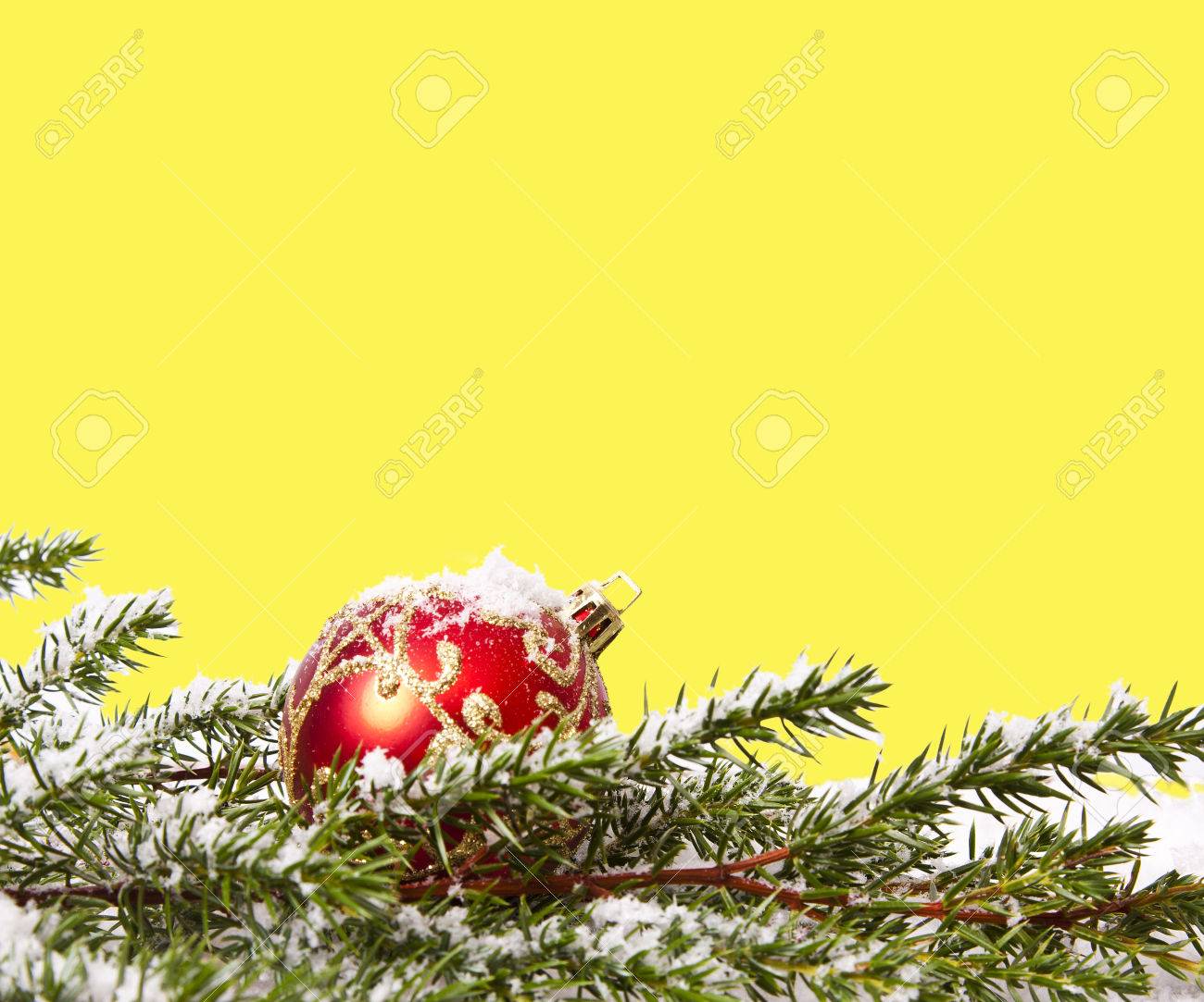 christmas ornaments and decorations on yellow background stock photo yellow ornaments