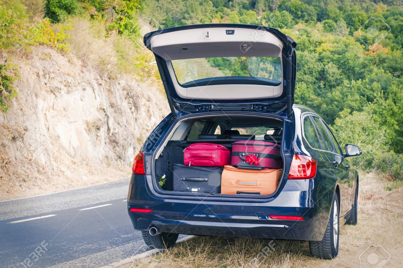 car with trunk loaded with suitcases and luggage - 92563670 car with trunk loaded with suitcases and luggage - 92563670