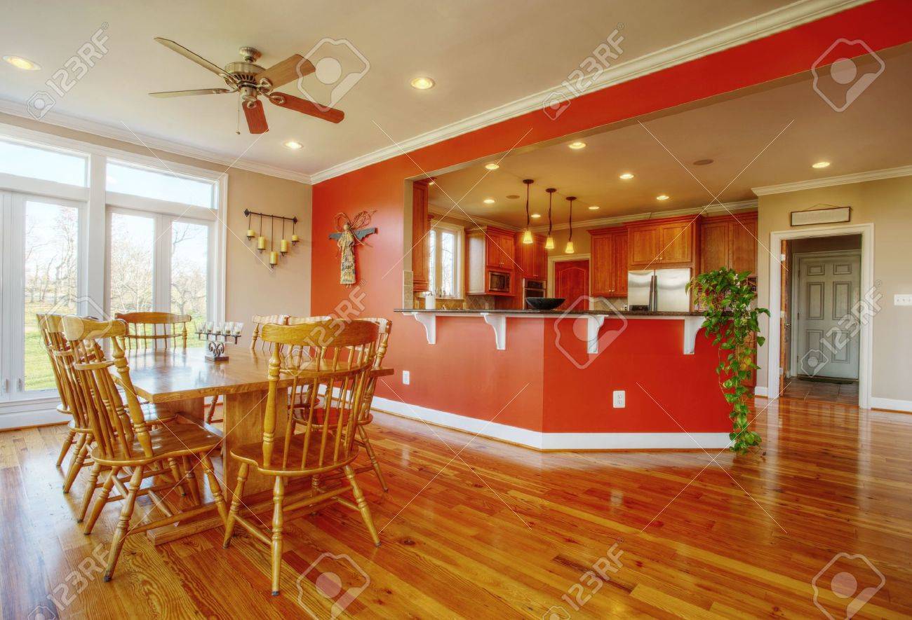 View Of A Home's Dining Area With Hardwood Floors A Kitchen View Of A Home's Dining Area With Hardwood Floors A Kitchen