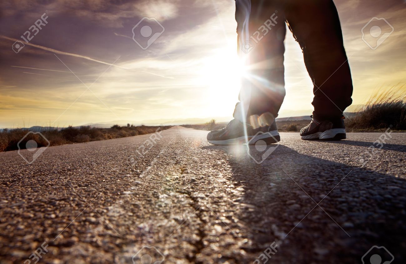 anonymous man on the road and sunset landscape.travel concept - 26870478 anonymous man on the road and sunset landscape.travel concept - 26870478