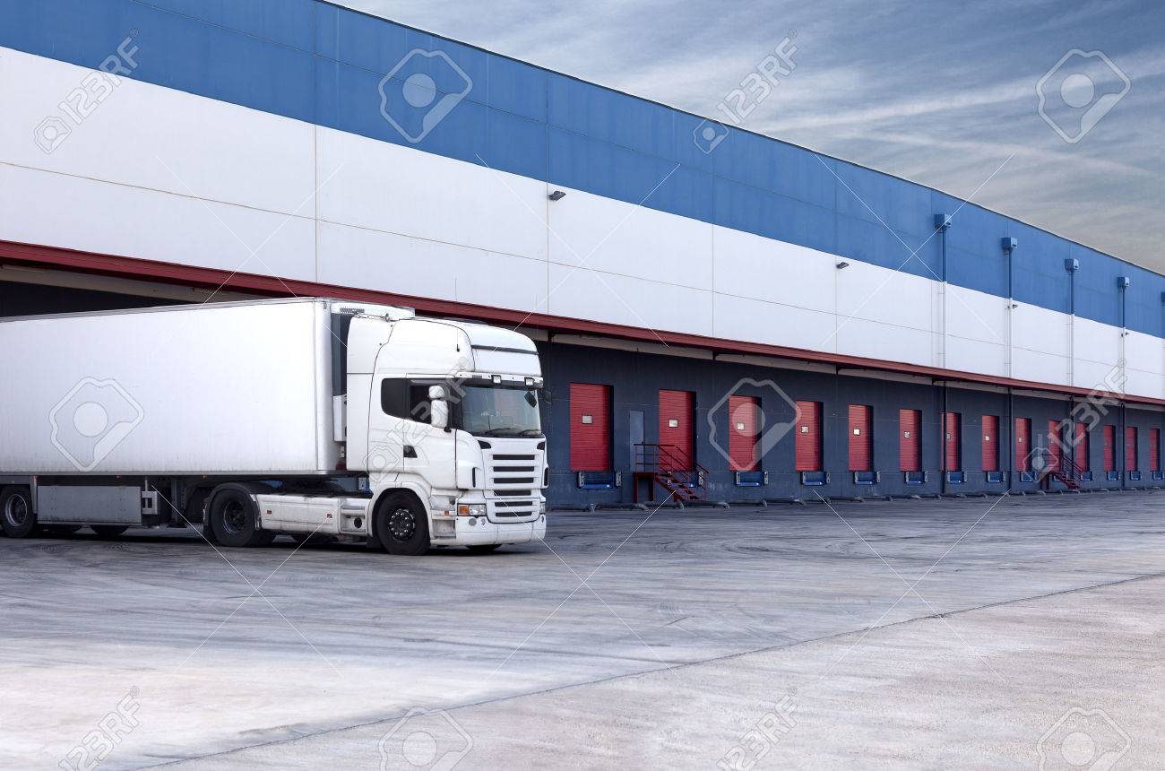 truck loading at a warehouse building. - 26870507 truck loading at a warehouse building. - 26870507