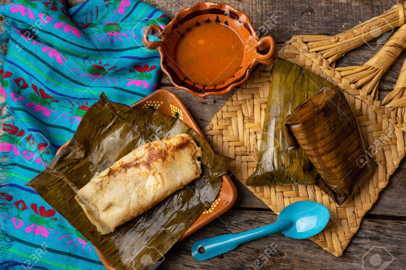 Traditional Mexican Tamales Wrapped In Banana Leaves Also Called \, image size:1300x867