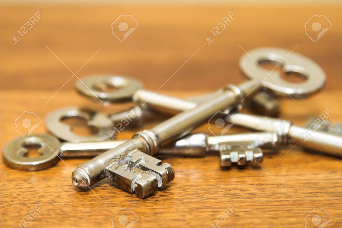 Antique Door Keys On A Wooden Surface Stock Photo, Picture And Antique door keys on a wooden surface Stock Photo - 2988186 - Antique Door Keys On A Wooden Surface Stock Photo, Picture And