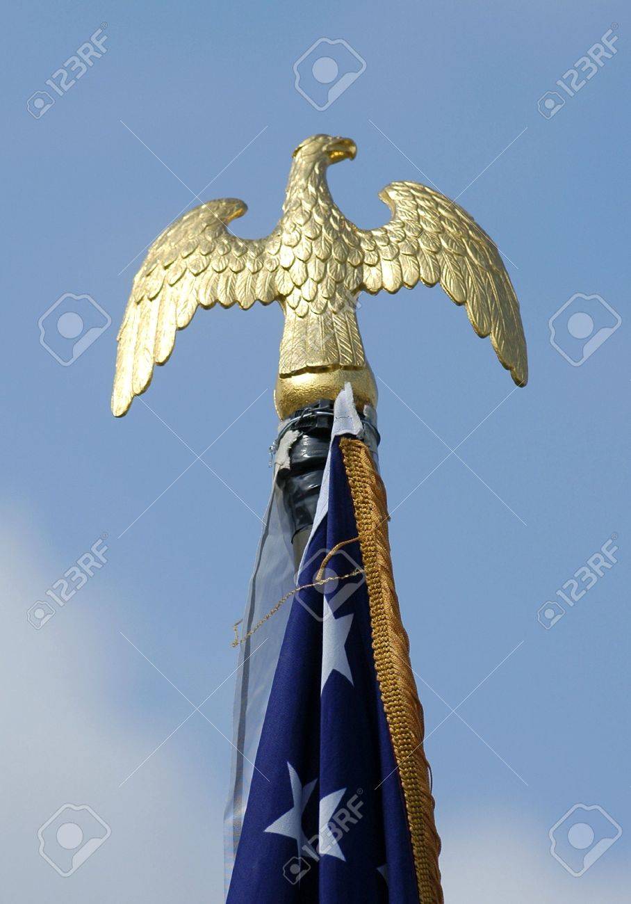 American Golden Eagle Sculture Over Us Flag