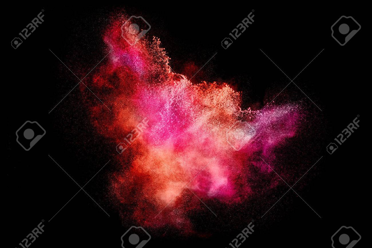 Colorful dust particle explosion resembling a pyrotechnic effect over black. Abstract background. Closeup of a color explosion isolated on black - 55147189 Colorful dust particle explosion resembling a pyrotechnic effect over black. Abstract background. Closeup of a color explosion isolated on black - 55147189