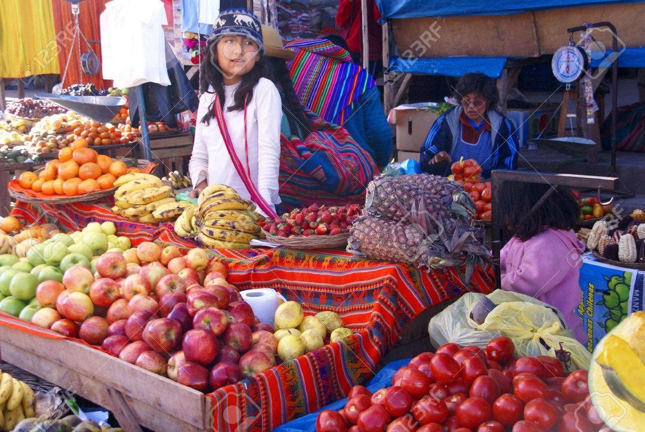 Indian girl selling vegetables, Pisac market, Cusco, Peru, South America - 11501873 Indian girl selling vegetables, Pisac market, Cusco, Peru, South America - 11501873