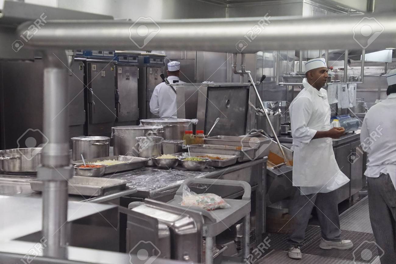 Caribbean Sea Dec 20 2017 Kitchen Crew Work In The Galley