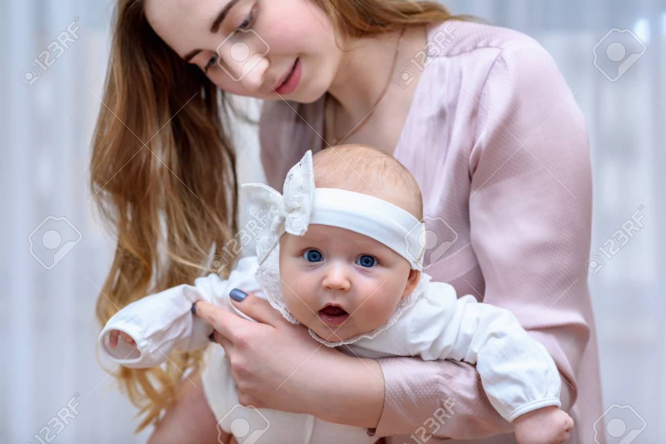 mother holding her baby
