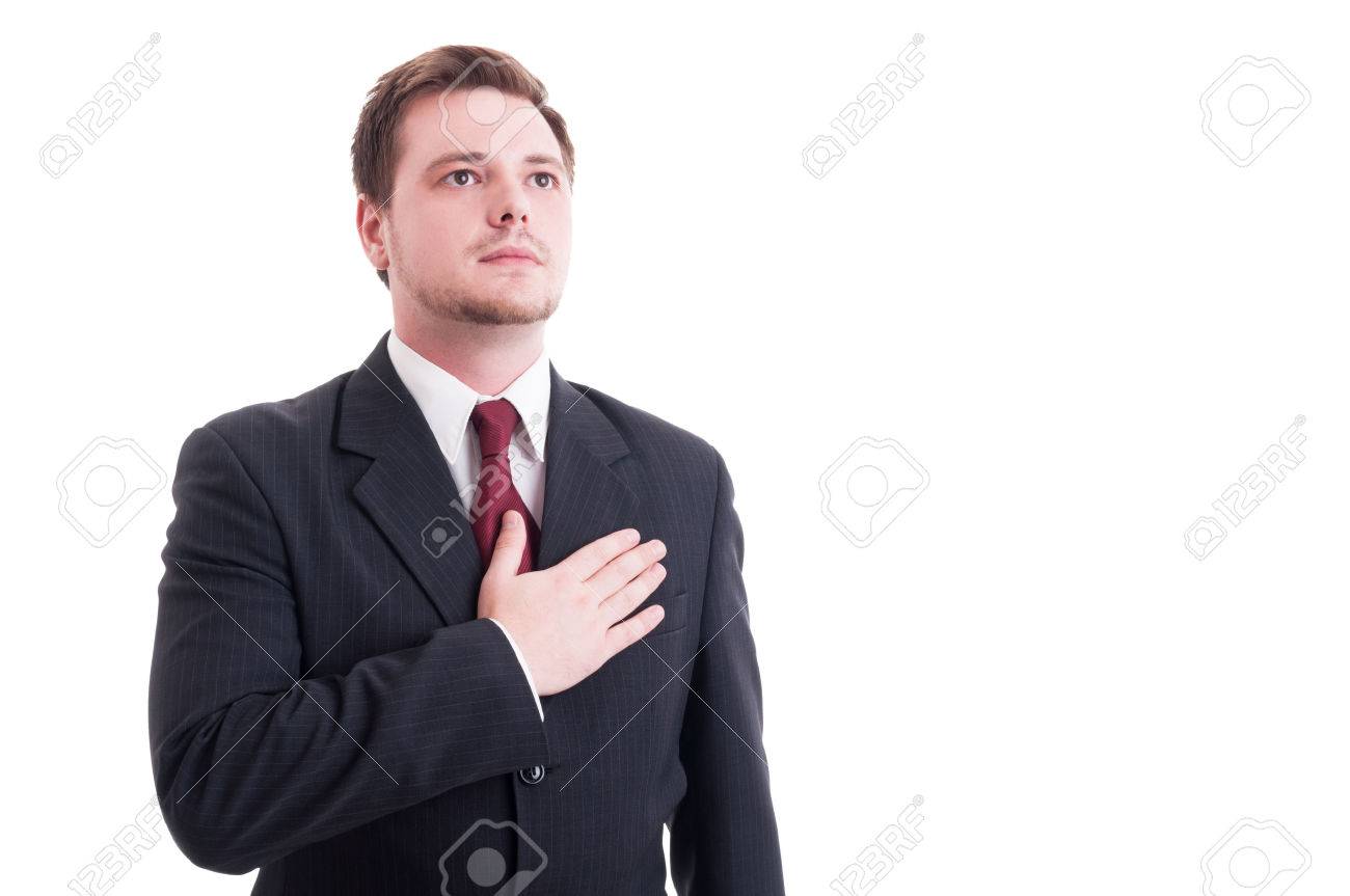 Proud businessman or lawyer holding one hand on heart isolated on white - 45682256 Proud businessman or lawyer holding one hand on heart isolated on white - 45682256