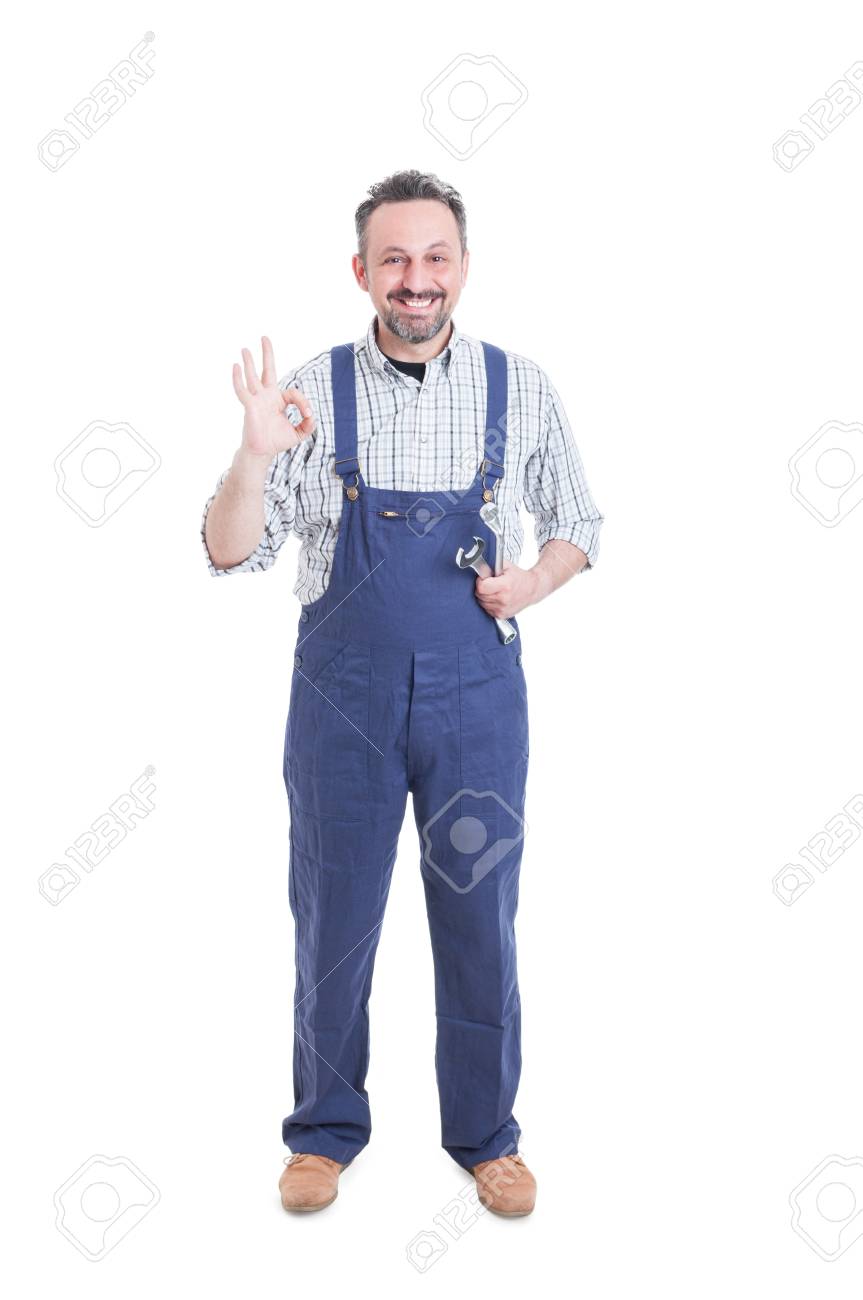 Trusthworthy mechanic showing ok gesture, holding mechanical tools and smiling isolated on white - 57157145 Trusthworthy mechanic showing ok gesture, holding mechanical tools and smiling isolated on white - 57157145