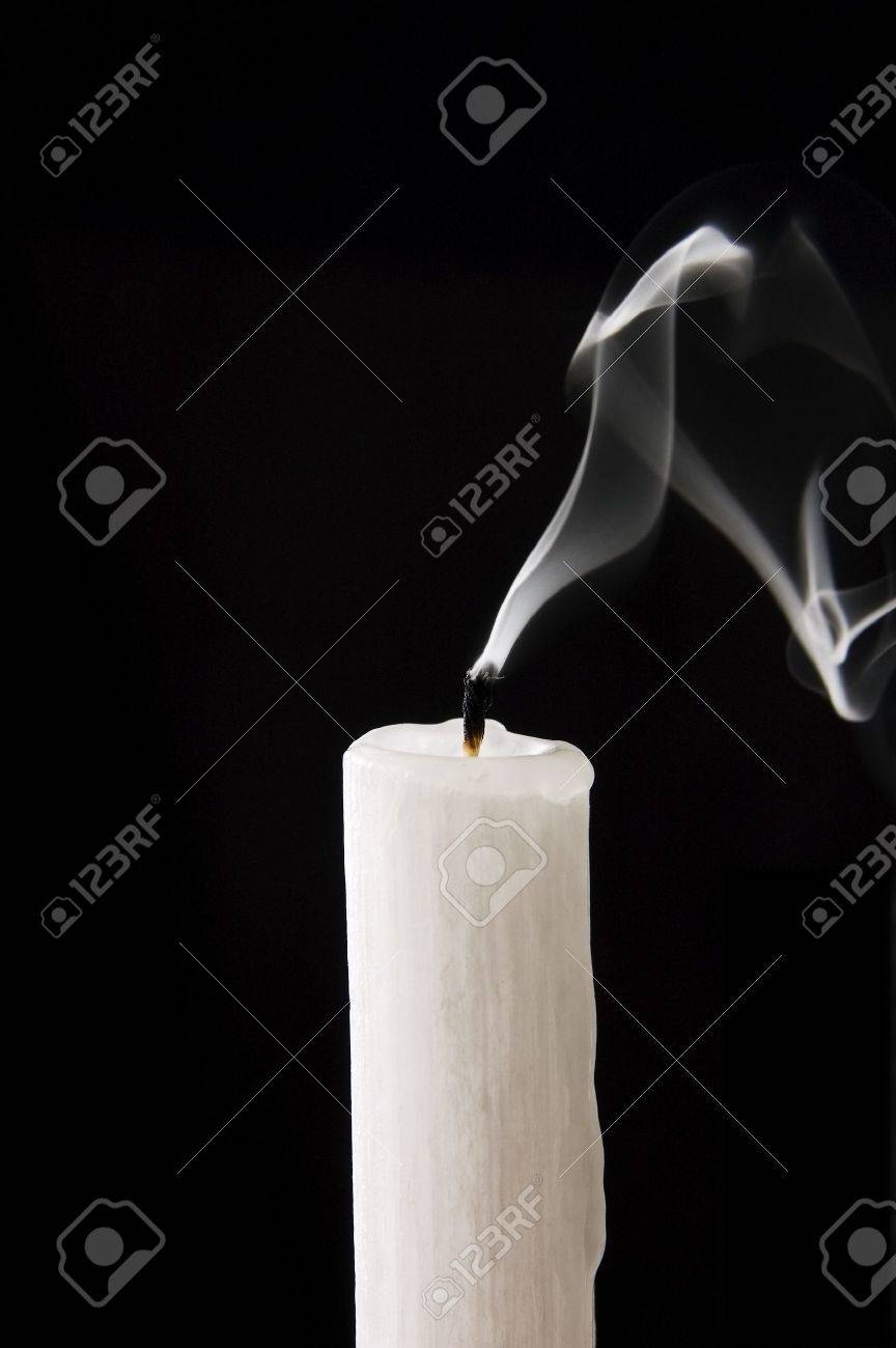 Extinguished Candle With Smoke Over Black Background Stock Photo Picture And Royalty Free Image Image