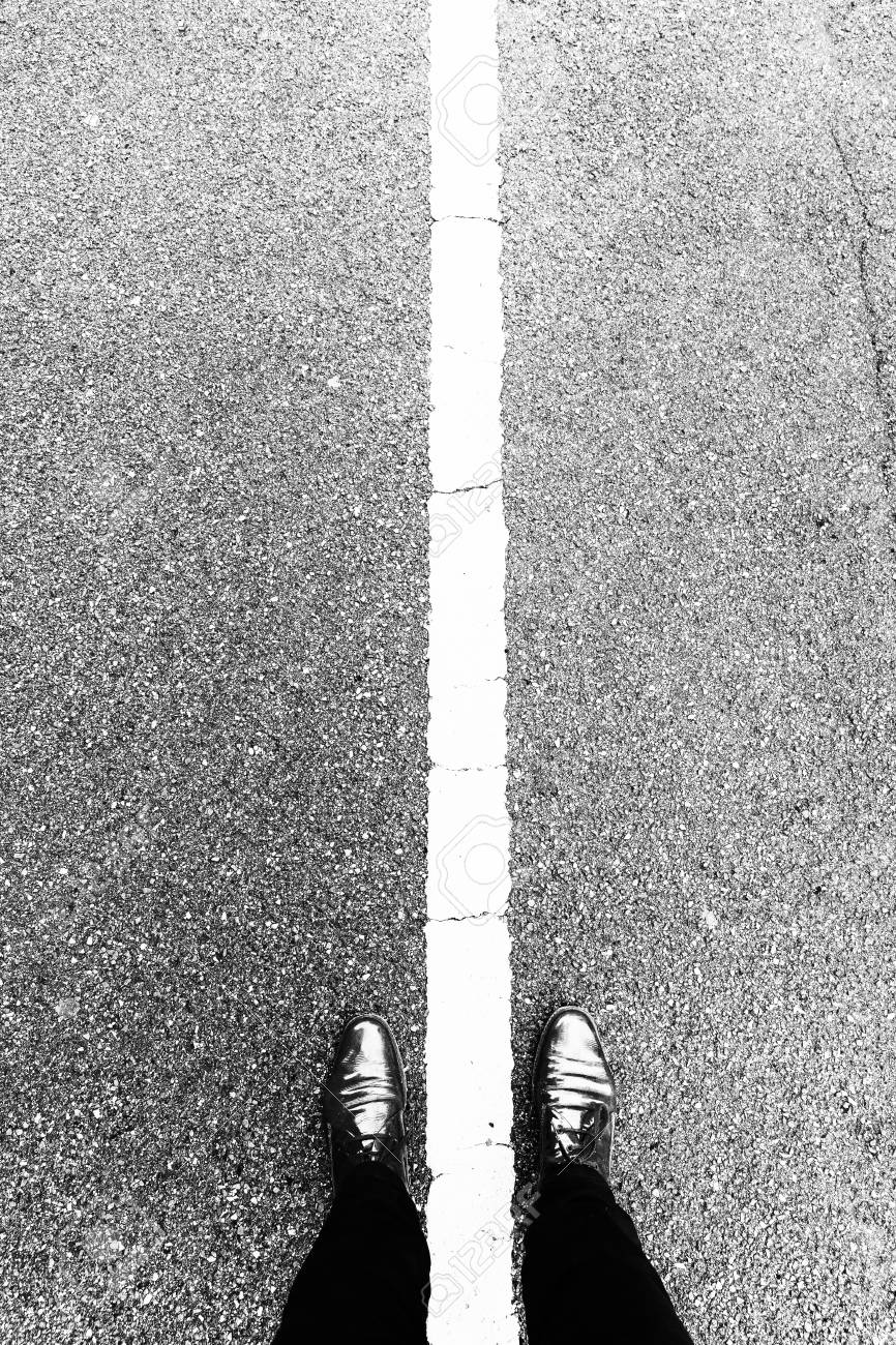 black shoes with white line on the side