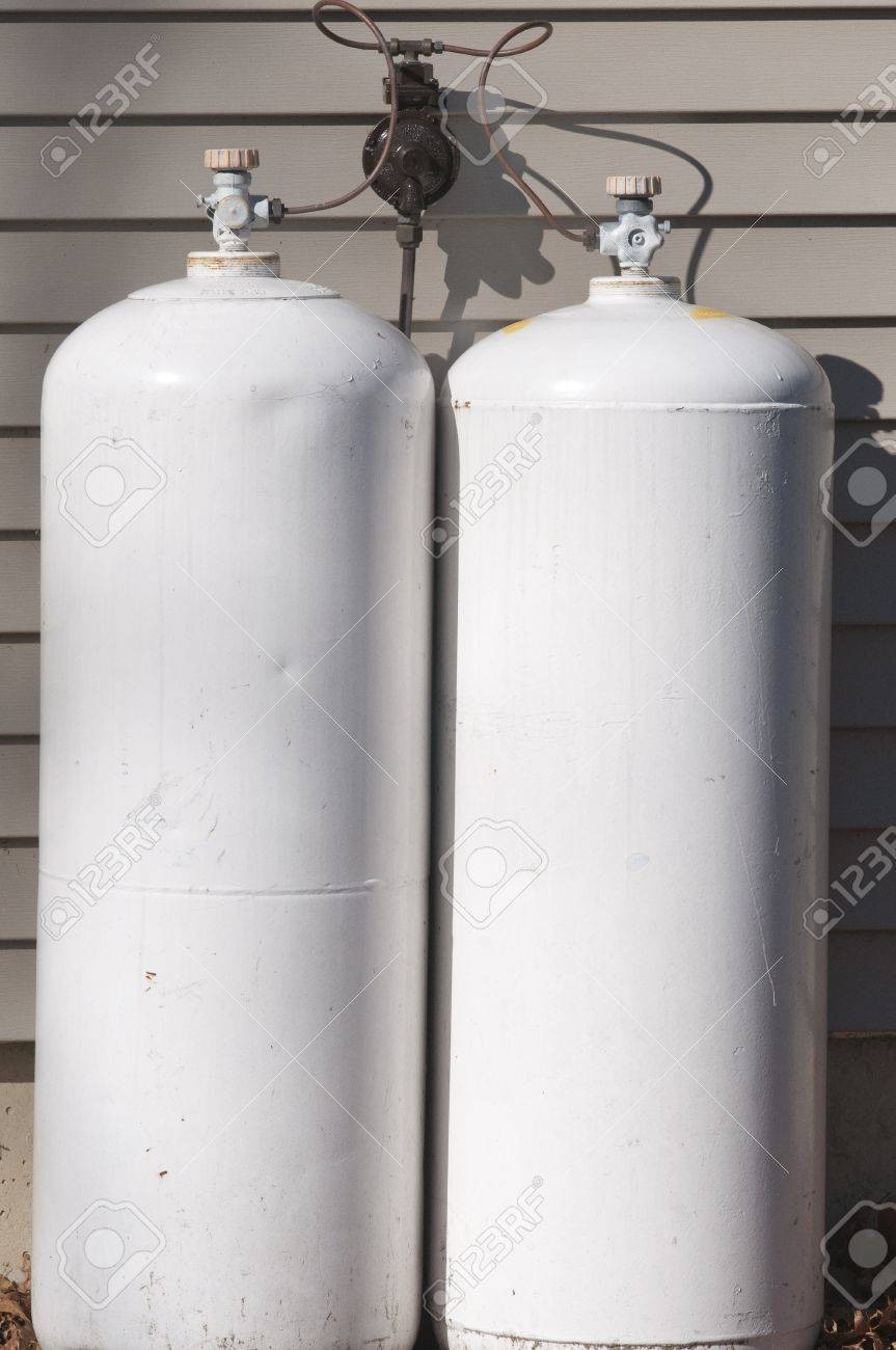 A Pair Of Propane Tanks Hooked Up To A House Stock Photo Picture And Royalty Free Image Image 12814521