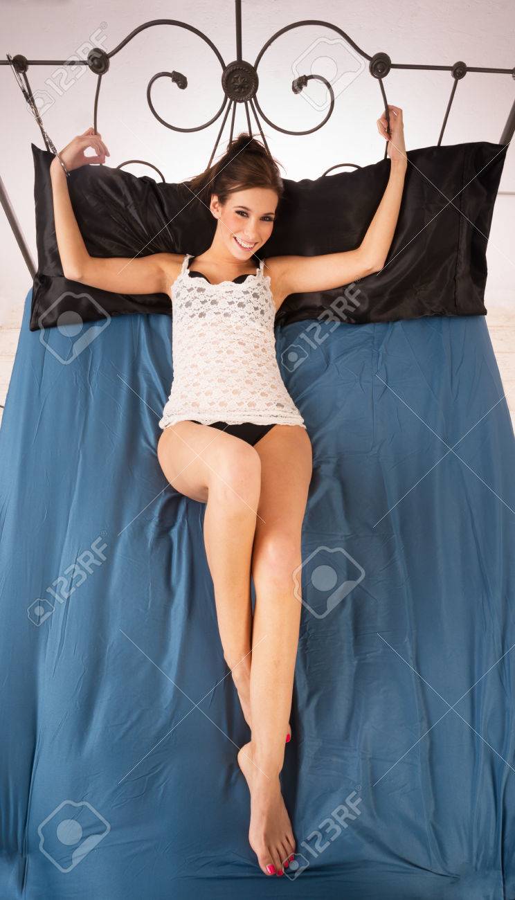 Woman Wearing Lace Restrained Handcuffed To Headboard Stock Photo 