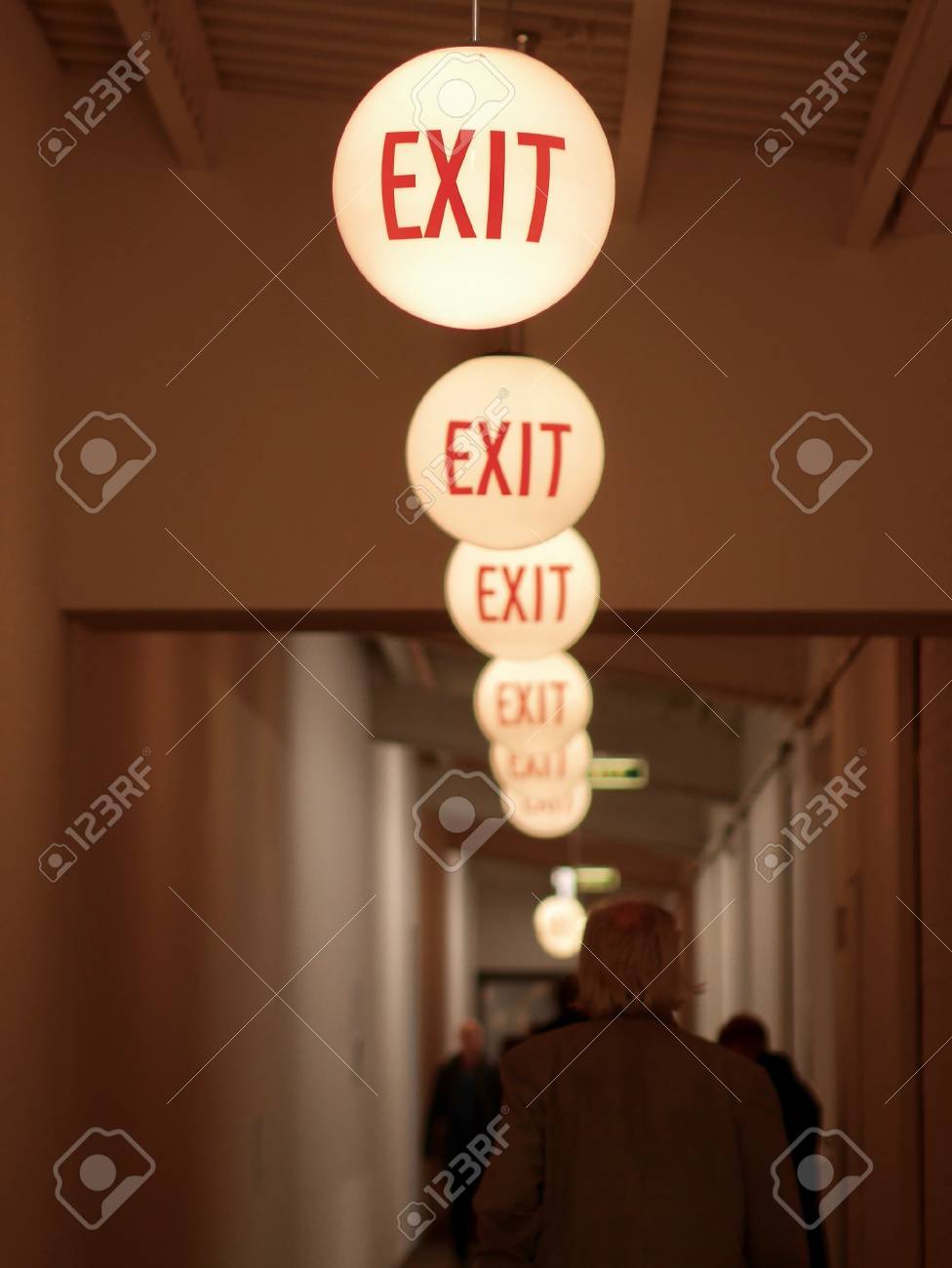 Row Of Round Illuminated Ceiling Lights In A Corridor Or Passage