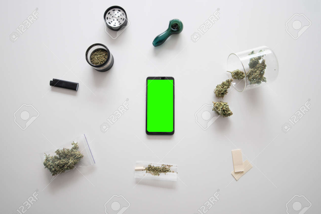 Download Smartphone Mockup Green Screen Mans Hands Marijuana Bud Cbd Stock Photo Picture And Royalty Free Image Image 150553151