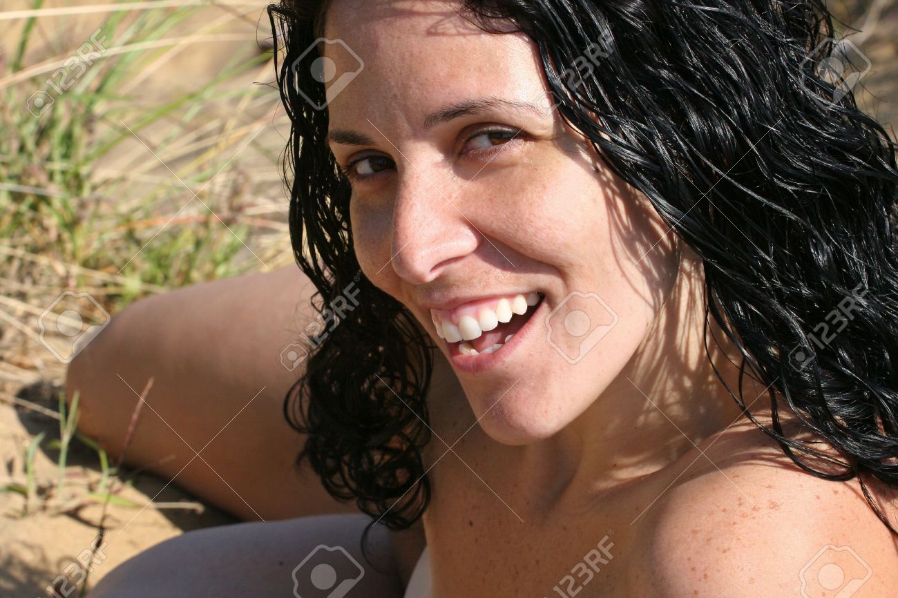 Nude Smiling Girl On The Beach In Tall Grass and Sand. (No body parts Nude Smiling Girl On The Beach In Tall Grass And Sand. (No Body ...