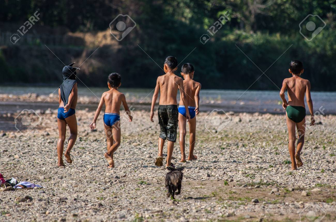 Group Of Children Near Laotian Song River, Vang Vieng, Laos. Stock Photo,  Picture and Royalty Free Image. Image 66384622.