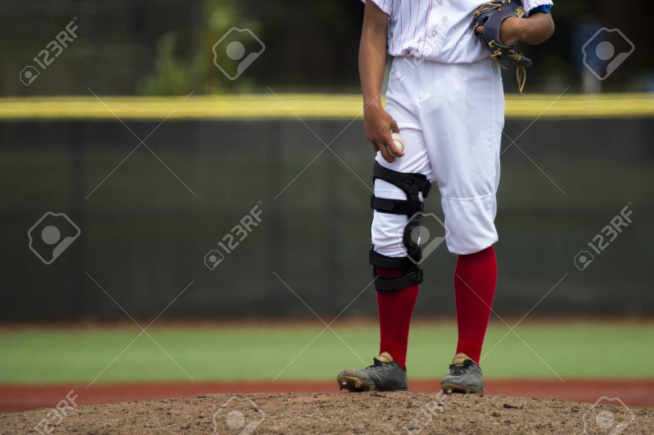 Close Up Of Baseball Players Legs With Red Stockings Standing Stock Photo Picture And Royalty Free Image Image Close Up Of Baseball Players Legs With Red Stockings Standing Stock Photo Picture And Royalty Free Image Image
