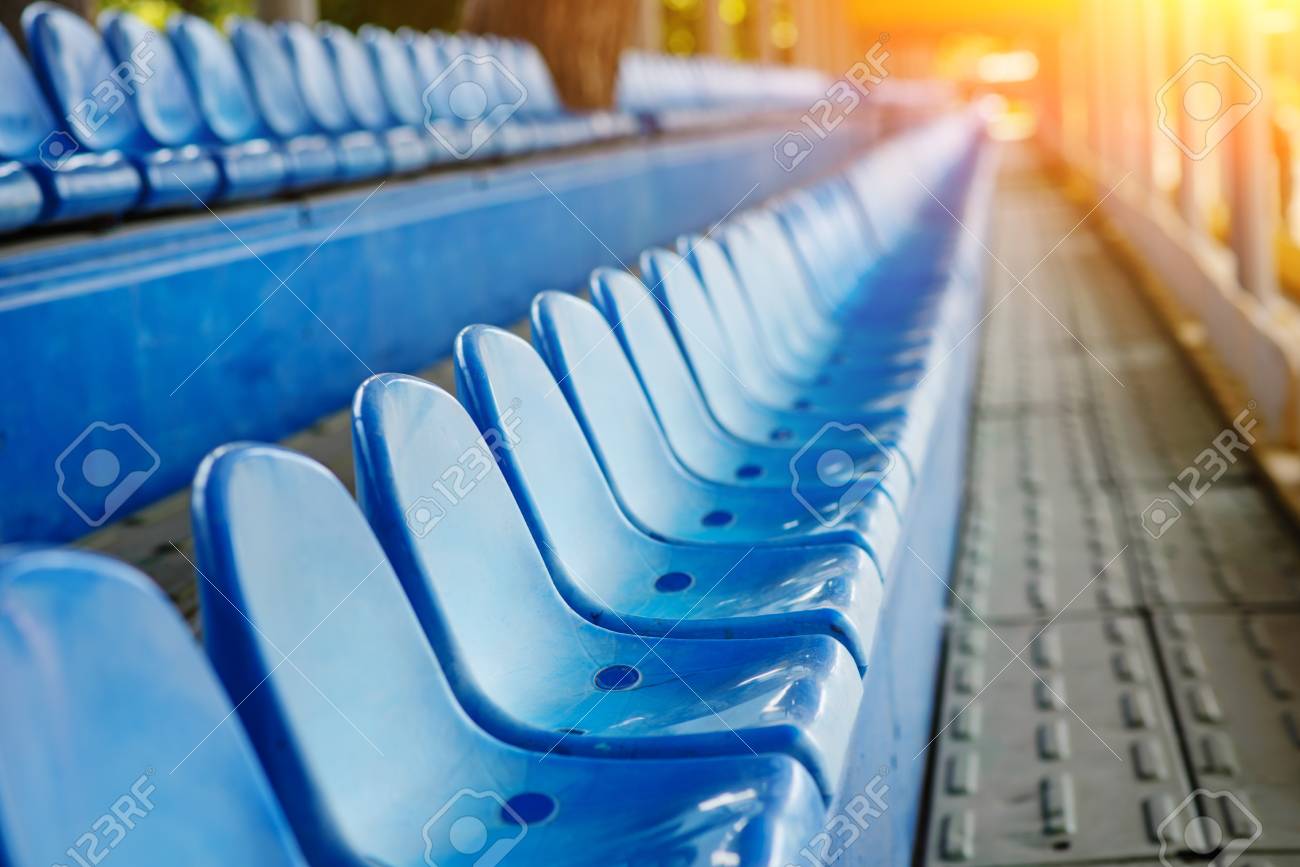 Empty plastic chairs in the stands of the stadium. - 110751069 Empty plastic chairs in the stands of the stadium. - 110751069