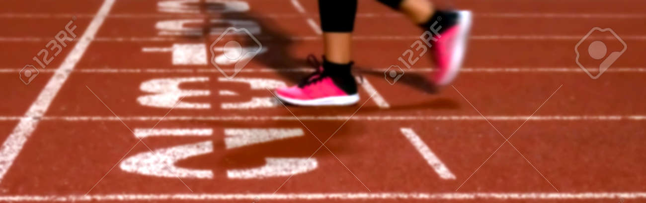 blurred athlete are jogging or walk at the start track stadium, running exercise concept - 169183492 blurred athlete are jogging or walk at the start track stadium, running exercise concept - 169183492