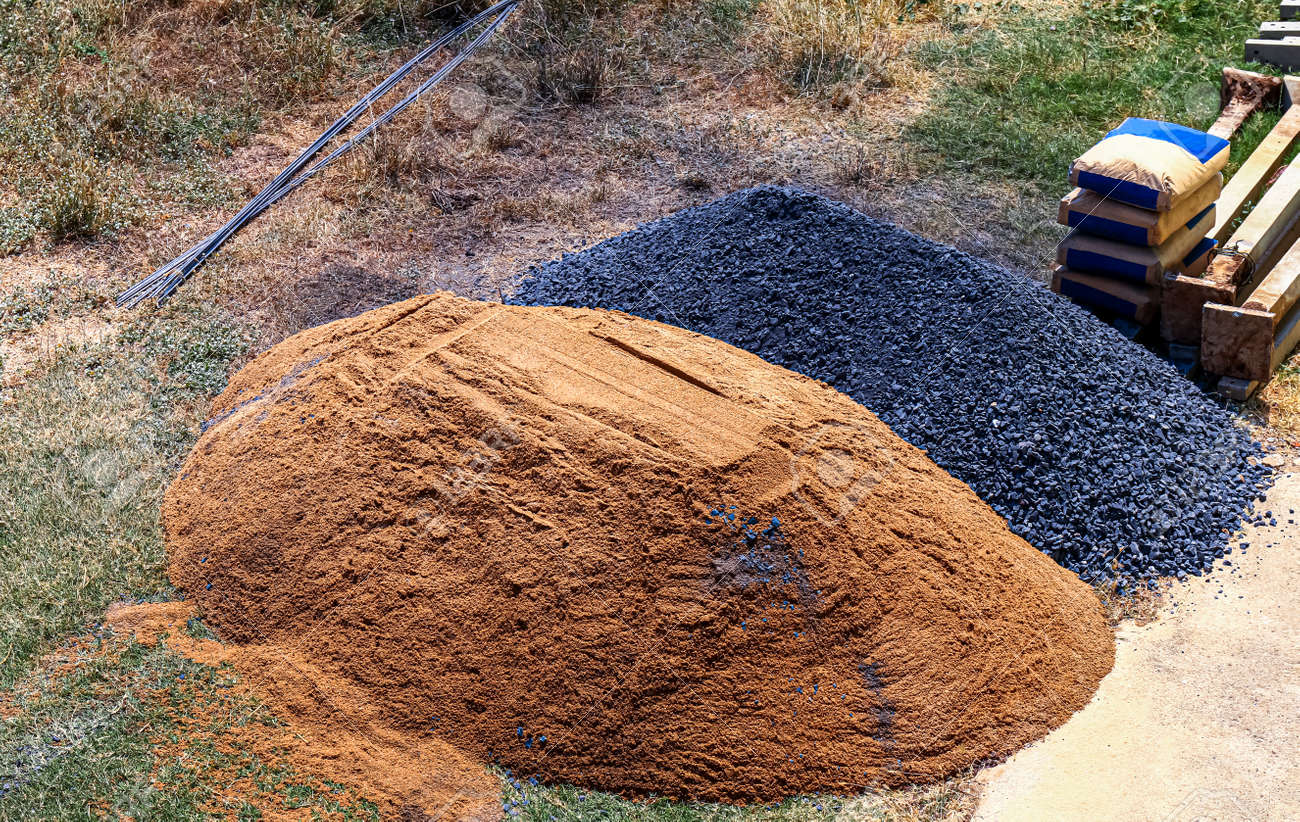 stone and sand pile at construction area, construction concept - 169183442 stone and sand pile at construction area, construction concept - 169183442