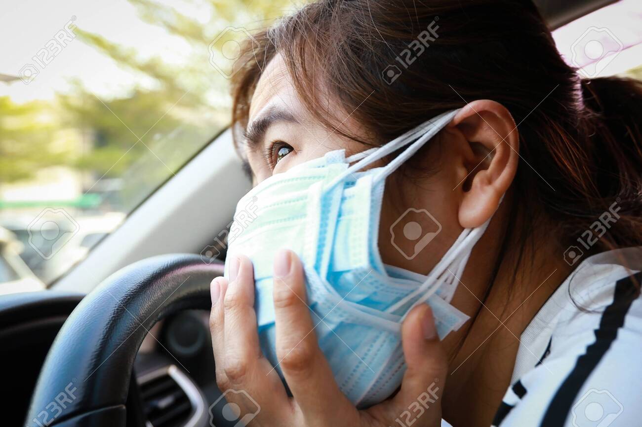 Woman Wearing Multiple Face Masks Stock Photo, Picture And Royalty Free  Image. Image 140351129.