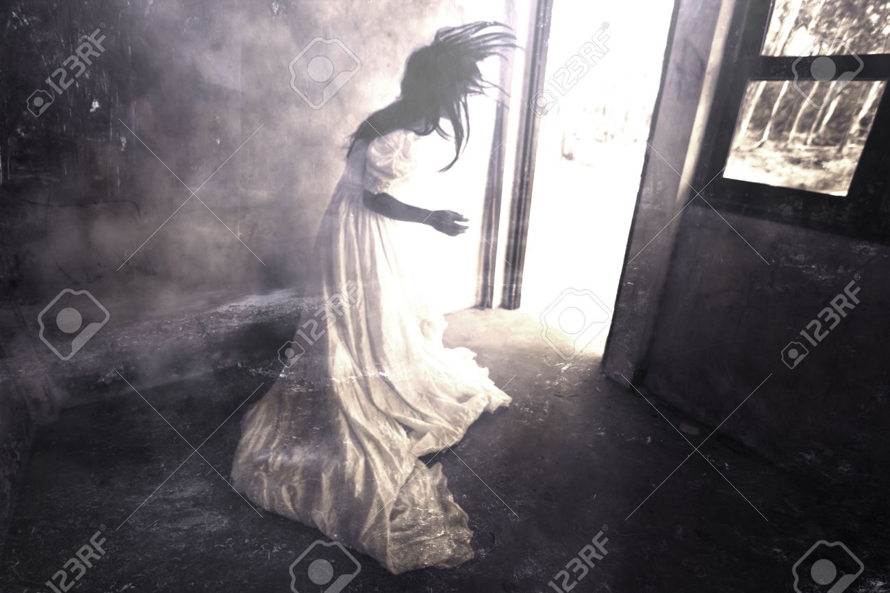 Ghost in Haunted House,Mysterious Woman in White Dress Standing in Abandon Building,Horror Background For Halloween Concept and Book Cover Ideas - 49544007 Ghost in Haunted House,Mysterious Woman in White Dress Standing in Abandon Building,Horror Background For Halloween Concept and Book Cover Ideas - 49544007