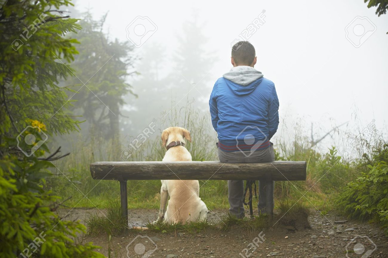 Lost man with his dog in mountain - 18912832 Lost man with his dog in mountain - 18912832