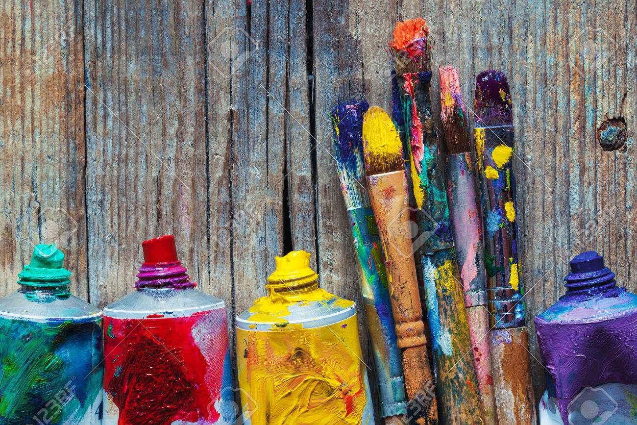 Tubes of oil paint and artist paint brushes closeup on wooden background. Retro styled. - 54790259 Tubes of oil paint and artist paint brushes closeup on wooden background. Retro styled. - 54790259