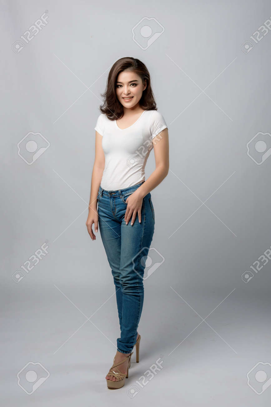 Beautiful Female Model . High Fashion Portrait sits In A Light Studio ,  Isolated On White Background. Stock Photo, Picture and Royalty Free Image.  Image 183890425.