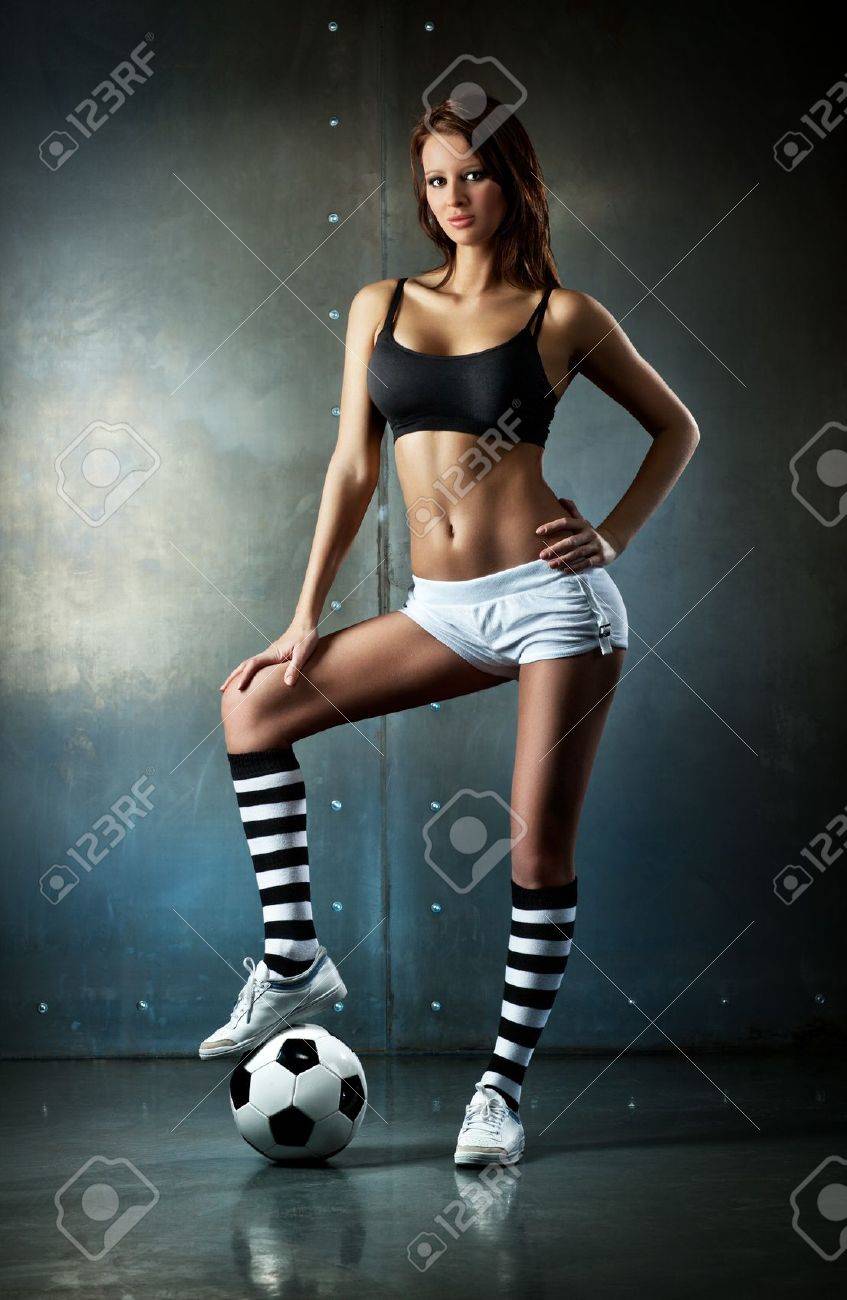 Young Sexy Woman Football Player. Stock 