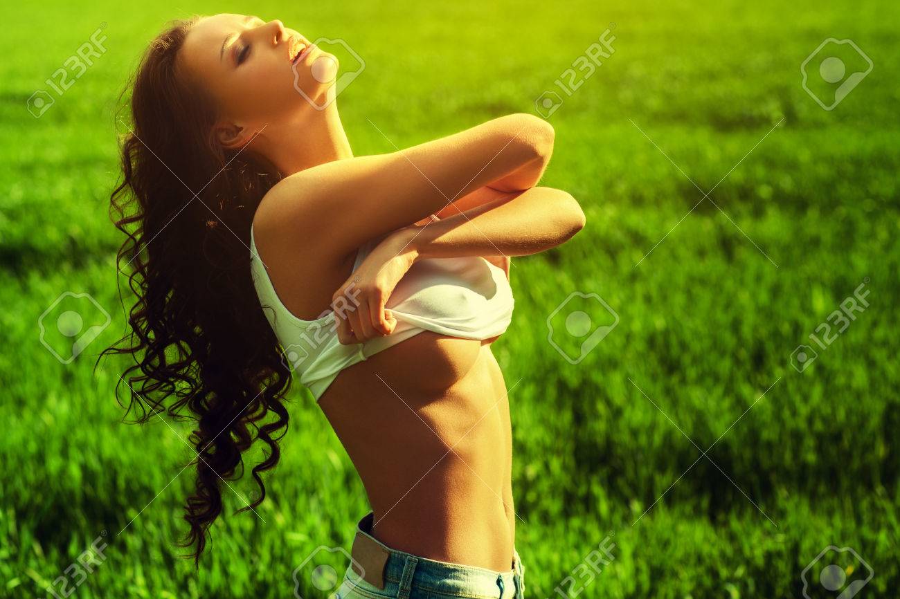 Young Sexy Woman Undressing. Stock Photo, Picture and Royalty Free Image.  Image 32207950.