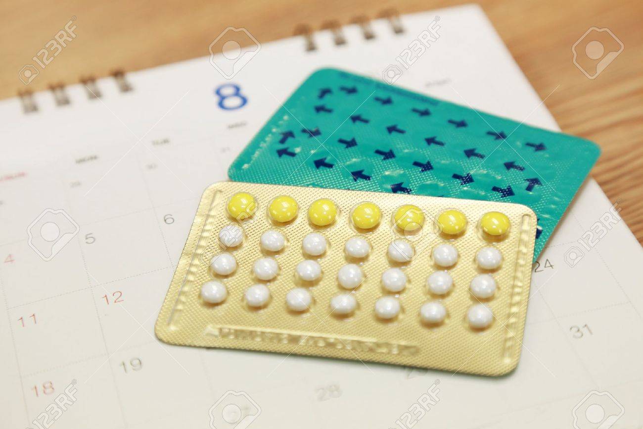 birth control pills on a calendar stock photo picture and royalty pill calendar