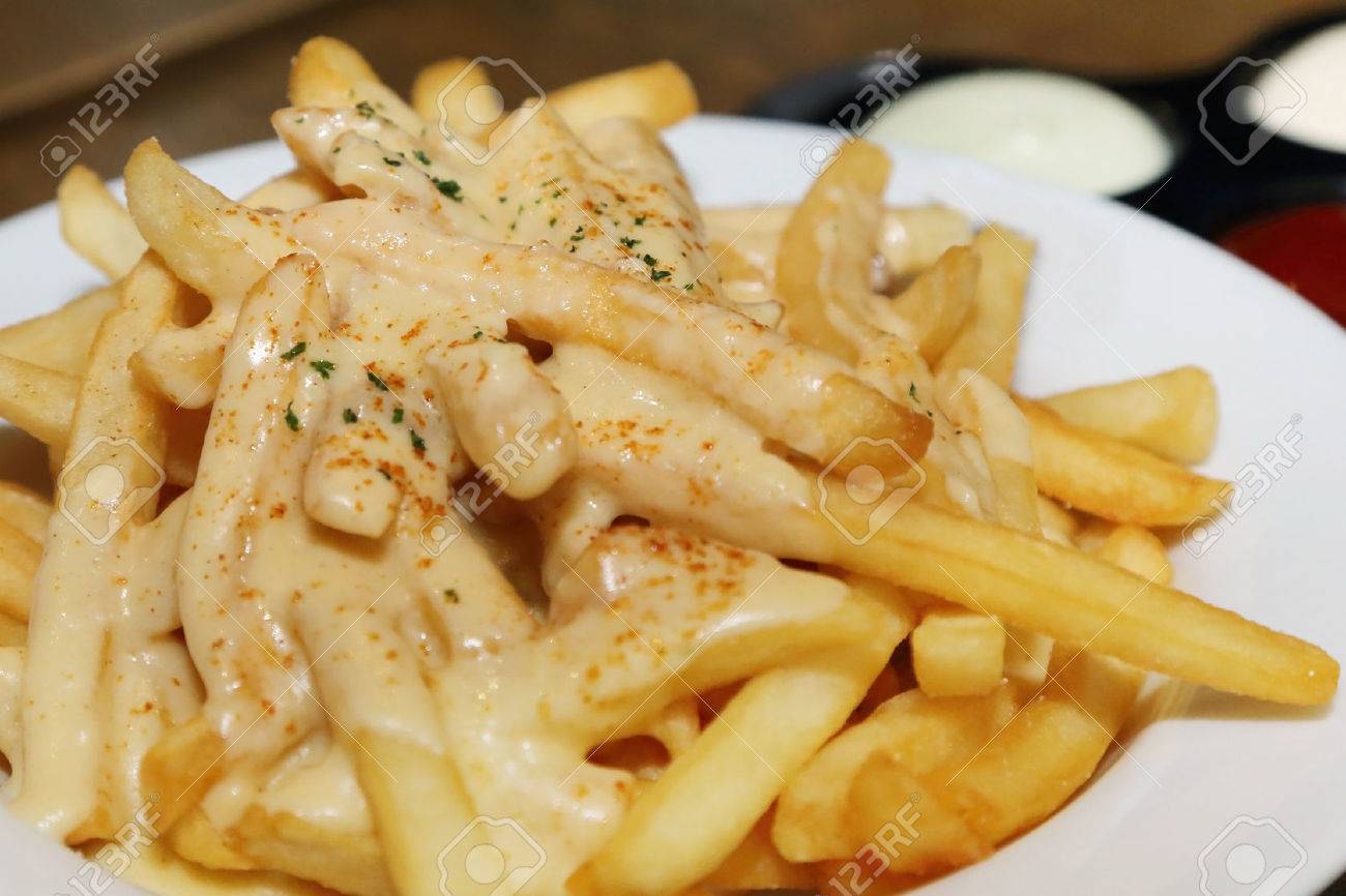 Download French Fries With Melted Cheese And Paprika Stock Photo Picture And Royalty Free Image Image 36630716 Yellowimages Mockups