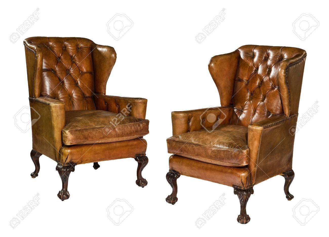 Pair Old Antique Brown Leather Wing Arm Chair 18 - 19th Century Pair old antique brown leather wing arm chair 18 - 19th century Stock Photo - 53585436 - Pair Old Antique Brown Leather Wing Arm Chair 18 - 19th Century