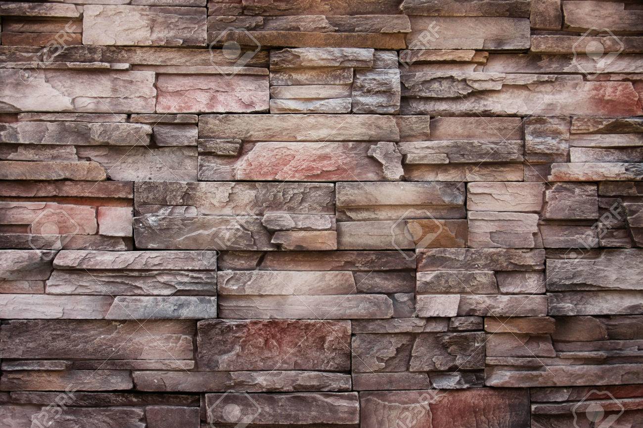 モダンなスタイルの石の古代色レンガ壁と抽象的なテクスチャ 内装工事のため の写真素材 画像素材 Image