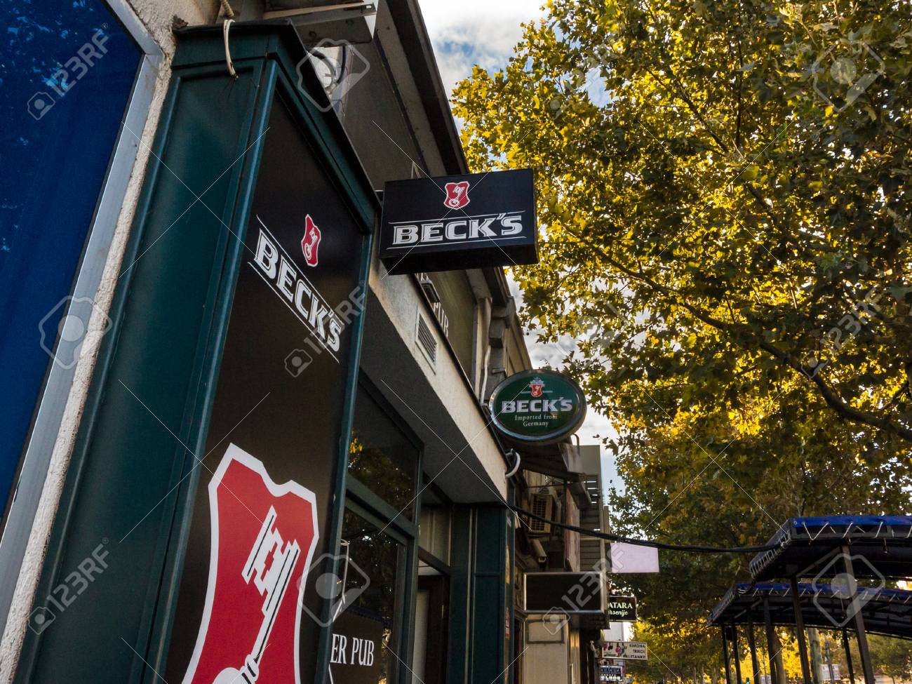 BELGRADE, SERBIA - SEPTEMBER 27, 2018: Logo of Beck's beer on a bar sign with its distinctive visual. Becks is a German light pilsner beer belonging to Interbrew group
Picture of a sign showing the logo of Beck's Beer, on a Serbian bar. Beck's is a light - 111379795 BELGRADE, SERBIA - SEPTEMBER 27, 2018: Logo of Beck's beer on a bar sign with its distinctive visual. Becks is a German light pilsner beer belonging to Interbrew group
Picture of a sign showing the logo of Beck's Beer, on a Serbian bar. Beck's is a light - 111379795
