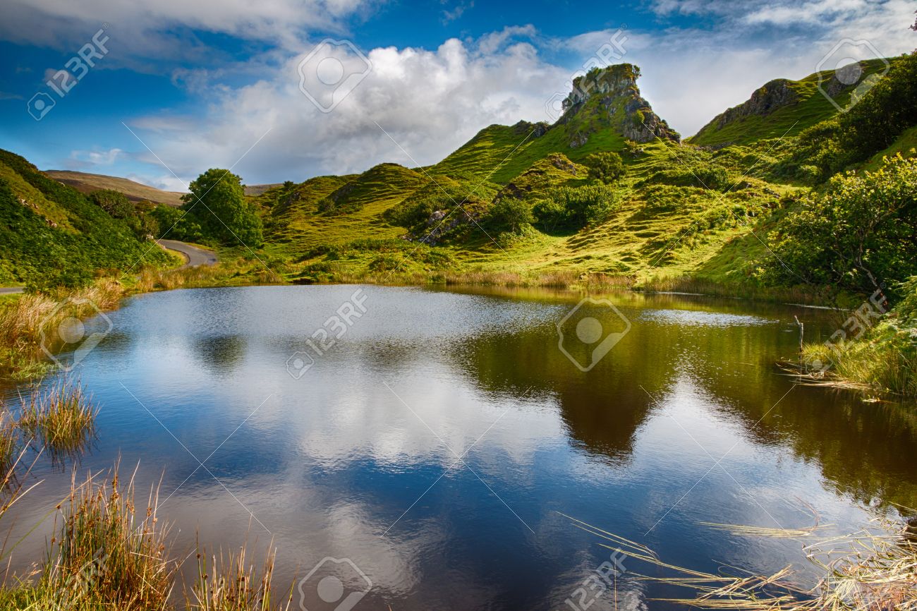 Mystic Fairy Glen, a romantic green valley with strange stone structures on the Isle of Skye, Scotland, HDR Version - 31575554 Mystic Fairy Glen, a romantic green valley with strange stone structures on the Isle of Skye, Scotland, HDR Version - 31575554