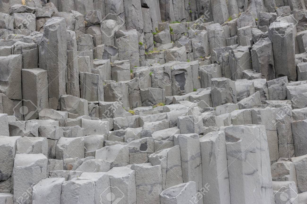 natural basalt stone columns on reynisfjara beach near the town stone columns