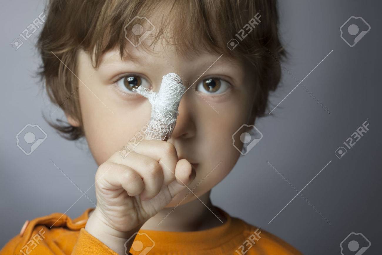 boy with a bandaged wound on his finger (focus on finger) - 43872694 boy with a bandaged wound on his finger (focus on finger) - 43872694