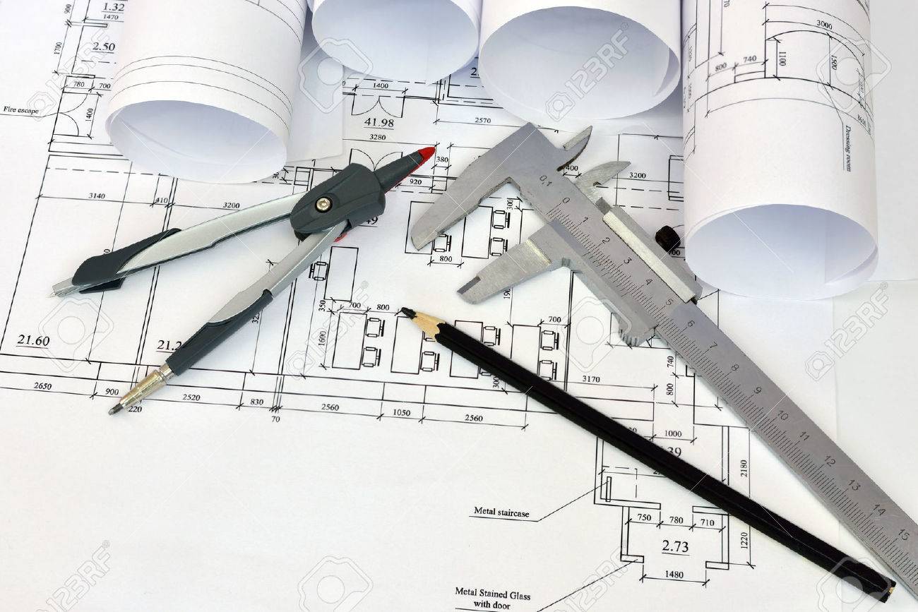 Architect Desk scrolls architectural drawings and tools of the architect desk Architect Desk scrolls architectural drawings and tools of the architect desk