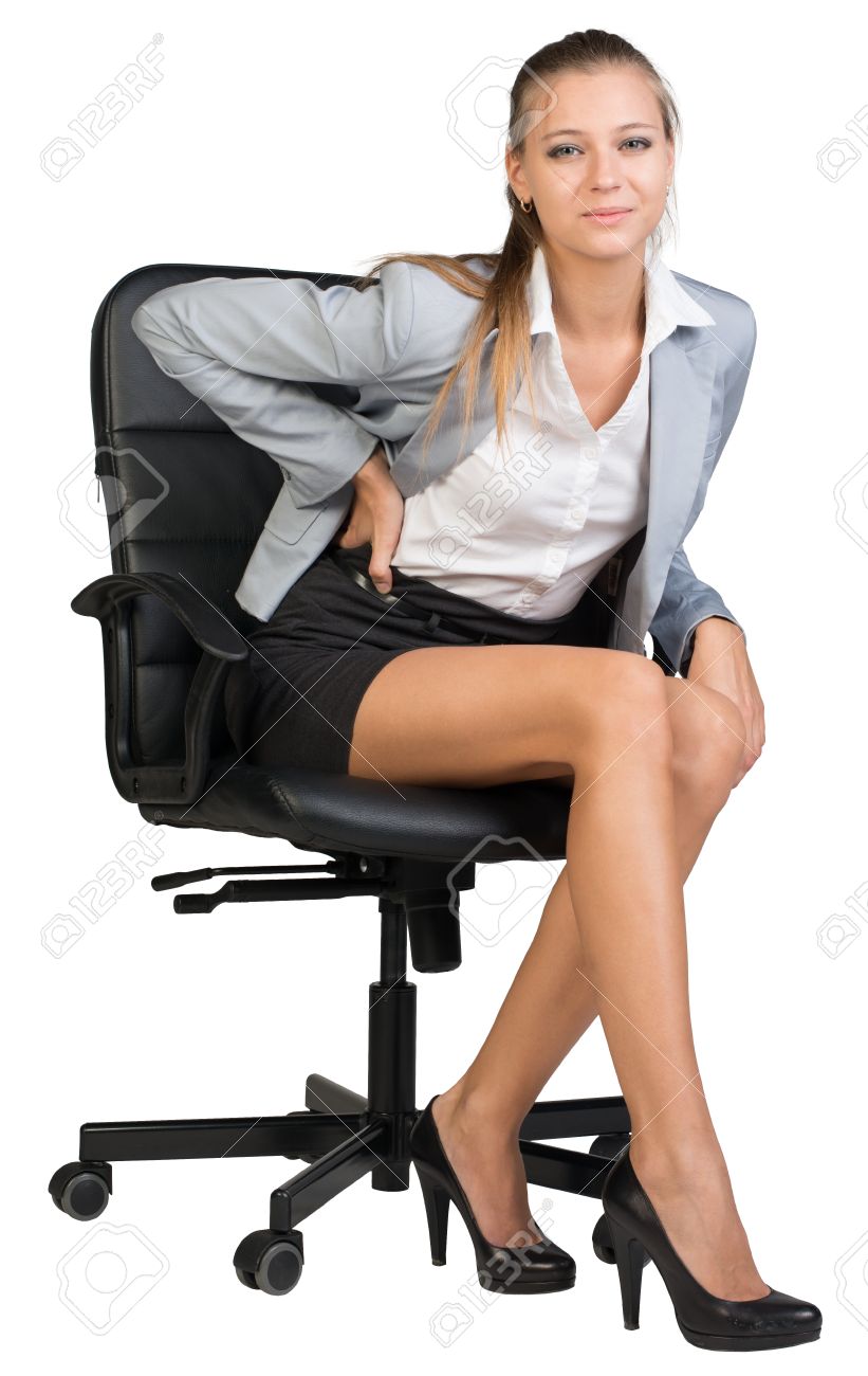 businesswoman with lower back pain from sitting on office chair businesswoman with lower back pain from sitting on office chair