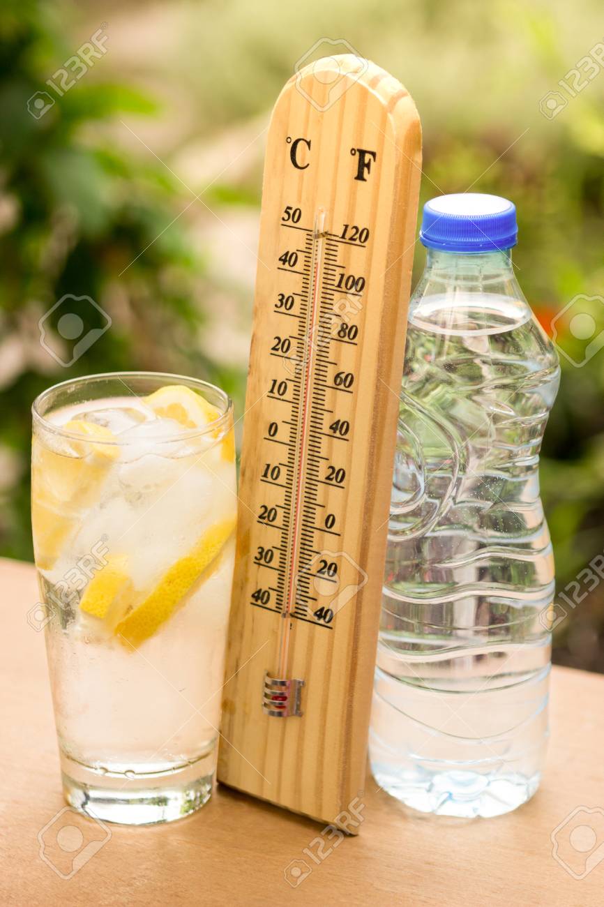 Ice Cubes In A Glass Of Water With Thermometer And Water Bottle Stock Photo Picture And Royalty Free Image Image 73214051